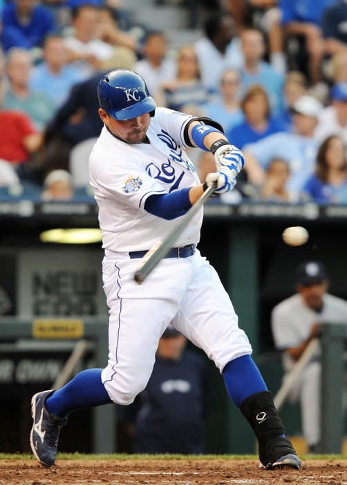 May 5, 2012; Kansas City, MO, USA; Kansas City Royals designated hitter Billy Butler (16) drives in a run with a double in the fifth inning against the New York Yankees at Kauffman Stadium. Mandatory Credit: John Rieger-US PRESSWIRE