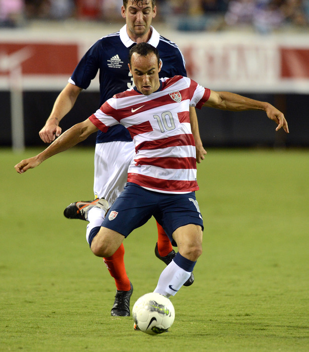 JACKSONVILLE, FL - MAY 26:  Landon Donovan #10 of Team USA, strikes the ball towards the goal against Team Scotland on May 26, 2012 at EverBank Field in Jacksonville, Florida. (Photo by Gary Bogdon/Getty Images)