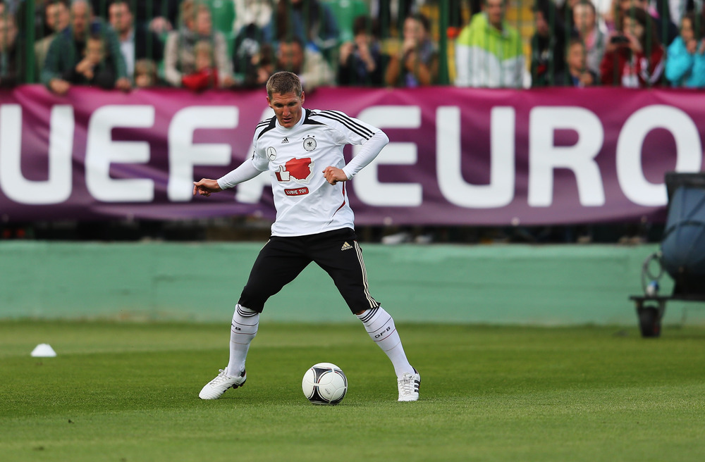 GDANSK, POLAND - JUNE 04:  Bastian Schweinsteiger of Germany controls the ball during a Germany training session at Lechia Gdansk stadium on June 4, 2012 in Gdansk, Poland.  (Photo by Joern Pollex/Bongarts/Getty Images)
