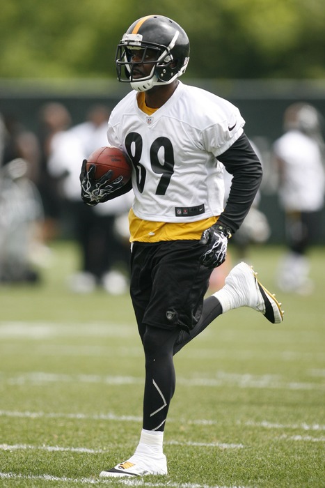 June 12, 2012; Pittsburgh, PA, USA; Pittsburgh Steelers receiver Jerricho Cotchery (89) runs after a pass reception during minicamp at the UPMC Sports Performance Complex. Mandatory Credit: Charles LeClaire-US PRESSWIRE