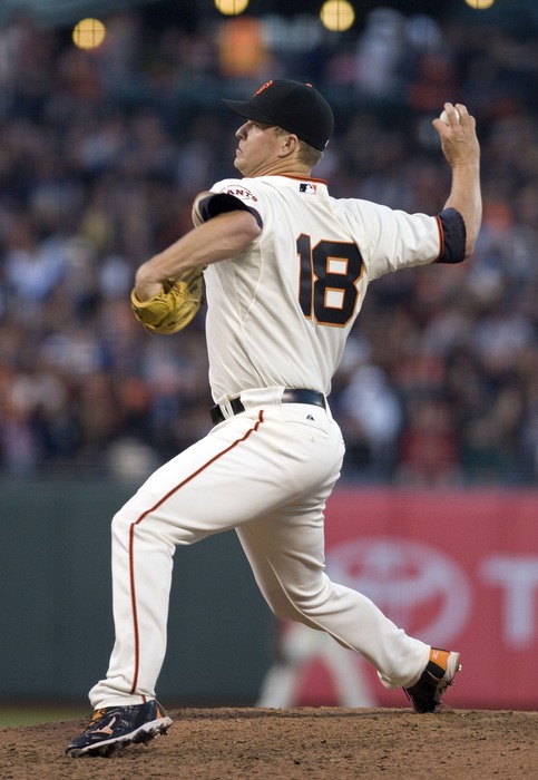 June 13, 2012; San Francisco, CA, USA; San Francisco Giants starting pitcher Matt Cain (18) throws a pitch during the game against the Houston Astros at AT&T Park.  Mandatory Credit: Ed Szczepanski-US PRESSWIRE