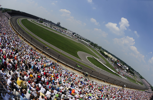 INDIANAPOLIS - MAY 30:  Cars race during the IZOD IndyCar Series 94th running of the Indianapolis 500 at the Indianapolis Motor Speedway on May 30, 2010 in Indianapolis, Indiana.  (Photo by Robert Laberge/Getty Images)