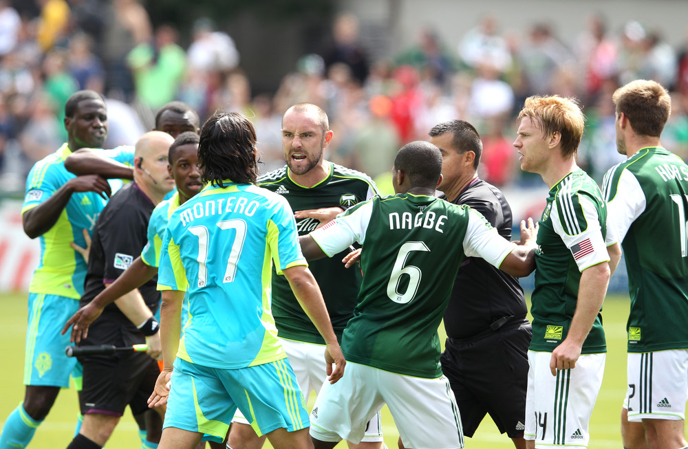 PORTLAND, OR -JUNE 24: Kris Boyd #9 of the Portland Timbers yells at Freddy Montero #17 of the Seattle Sounders  during their game on June 24, 2012 at Jeld-Wen Field in Portland, Oregon.(Photo by Tom Hauck/Getty Images)