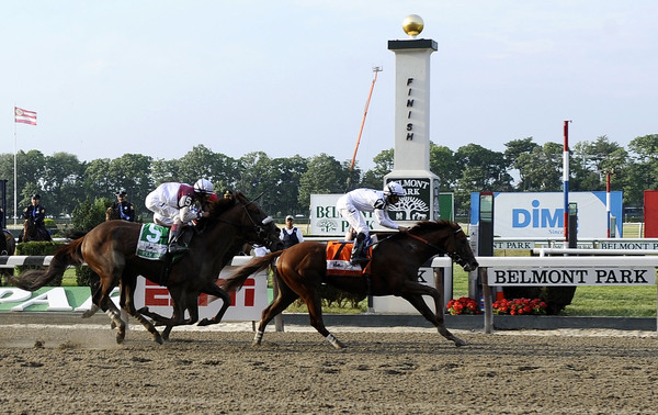 ELMONT, NY - JUNE 05:  Drosselmeyer, with Mike Smith aboard, wins the 142nd Running of the Belmont Stakes in front of Fly Down, with John Velazquez aboard at Belmont Park on June 5, 2010 in Elmont, New York.  (Photo by Jeff Zelevansky/Getty Images)