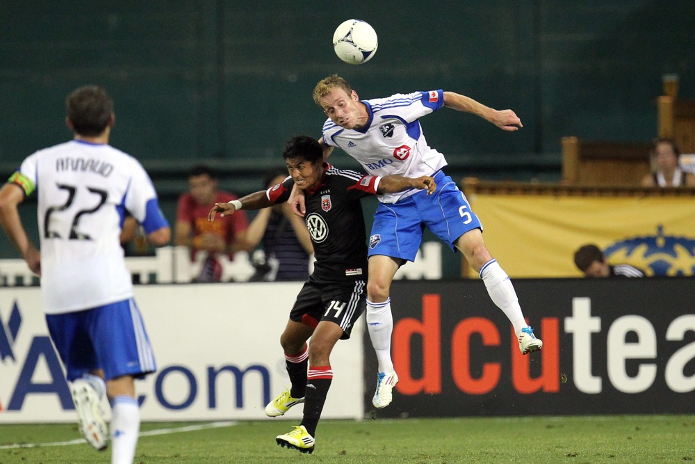 WASHINGTON, DC - JUNE 30: Tyson Wahl #5 of the Montreal Impact controls the ball against Andy Najar #14 of D.C. United at RFK Stadium on June 30, 2012 in Washington, DC.(Photo by Ned Dishman/Getty Images)