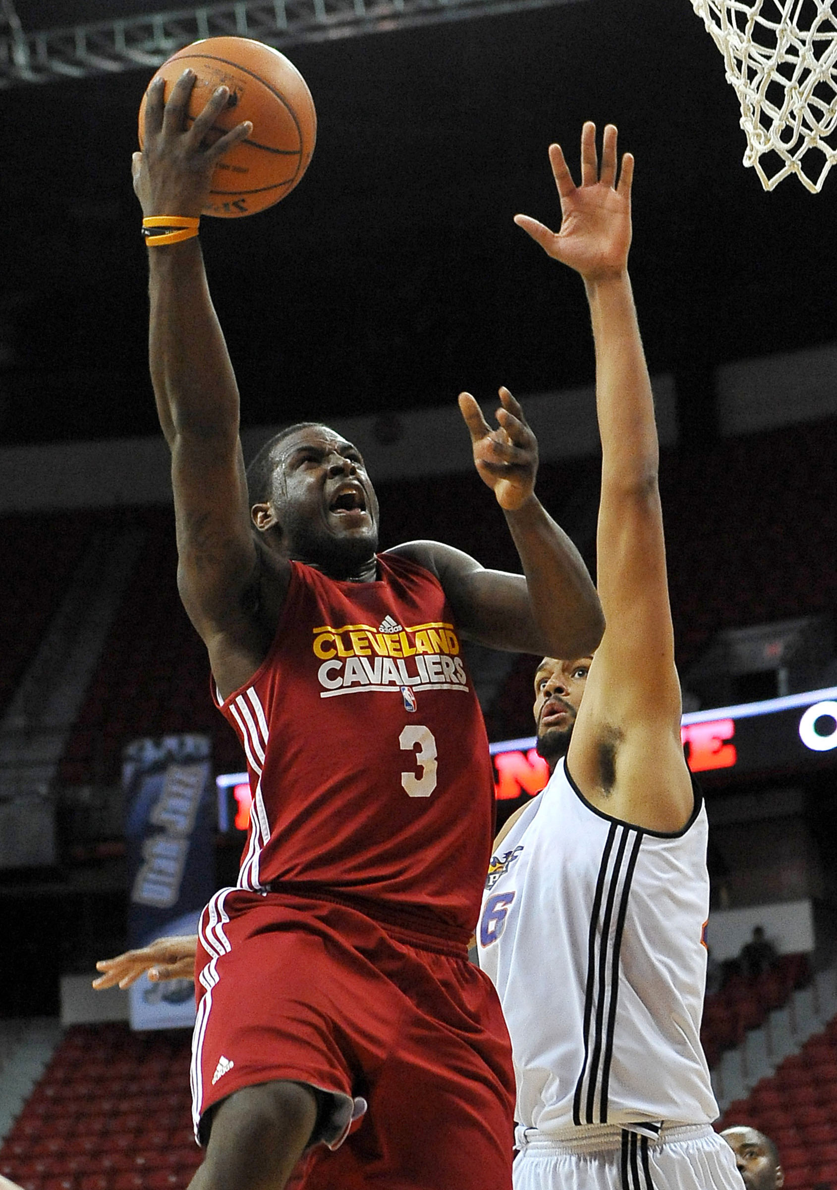 July 17, 2012; Las Vegas, NV, USA;   Cleveland Cavaliers guard Dion Waiters (3) makes a shot over Phoenix Suns center Patrick O'Bryant (26) during the game at the Thomas and Mack Center. Mandatory Credit: Jayne Kamin-Oncea-US PRESSWIRE