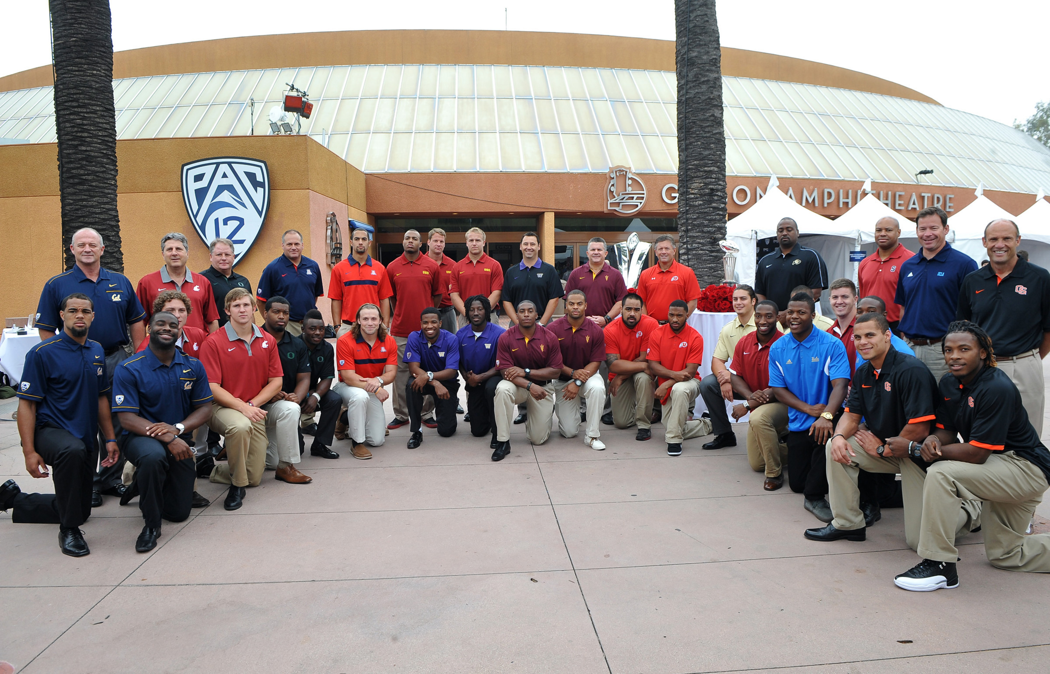 July 24, 2012; Los Angeles, CA, USA;    Players and coaches pose for a photo before the start of PAC-12 Media Day at Universal Studios Hollywood. Mandatory Credit: Jayne Kamin-Oncea-US PRESSWIRE