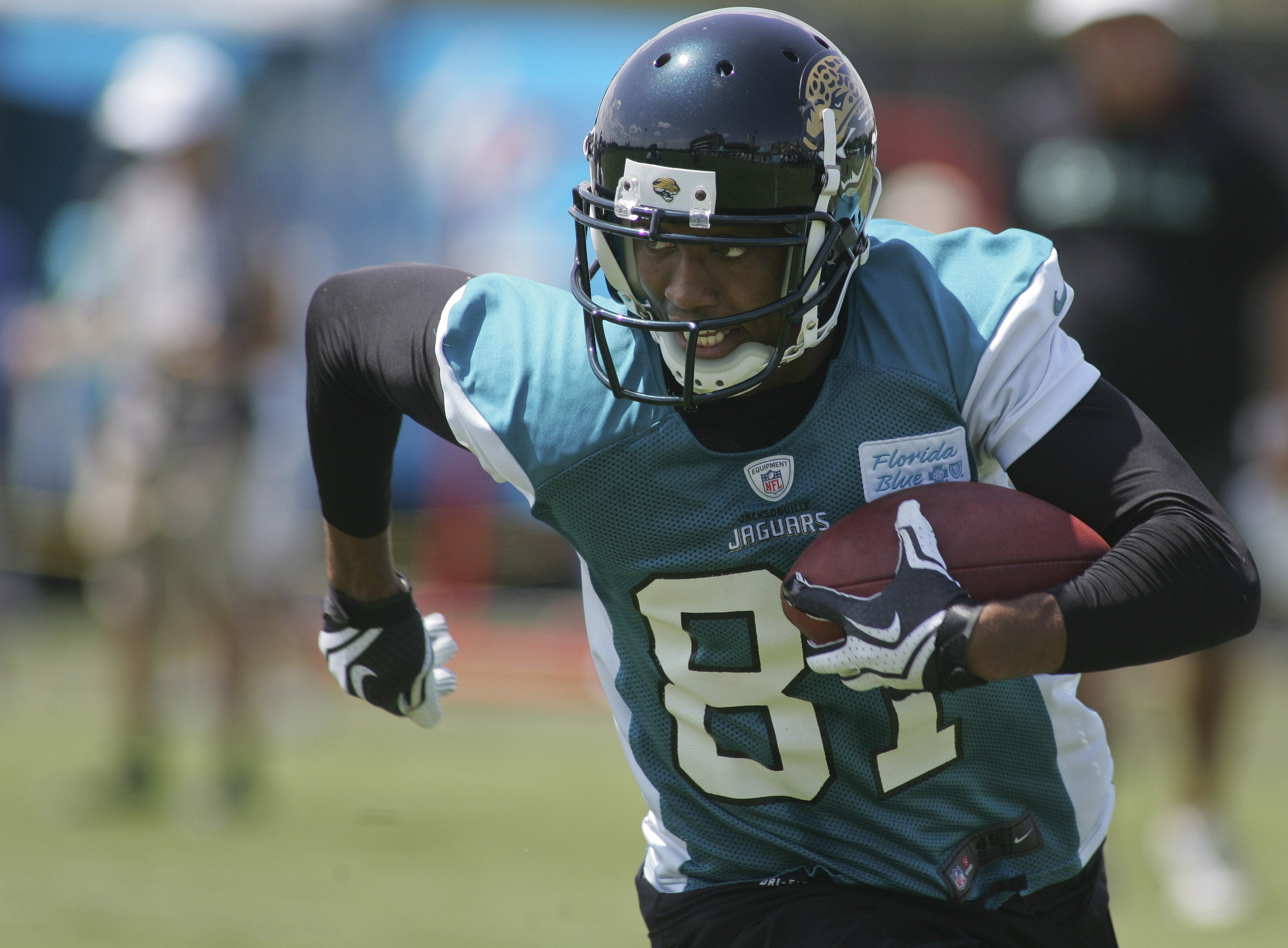 July 27, 2012; Jacksonville FL, USA; Jacksonville Jaguars wide receiver Laurent Robinson (81) runs during the first afternoon of training camp practice at Florida Blue Health & Wellness Practice Fields. Mandatory Credit: Phil Sears-US PRESSWIRE