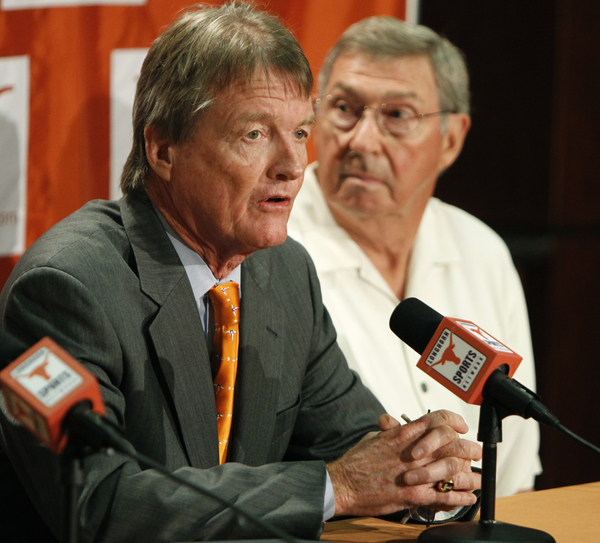 Is Chip Brown an investigative reporter, or is he merely releasing information that University of Texas at Austin President William Powers Jr., left, and Men's Athletics Director DeLoss Dodds want released.  (Photo by Erich Schlegel/Getty Images)