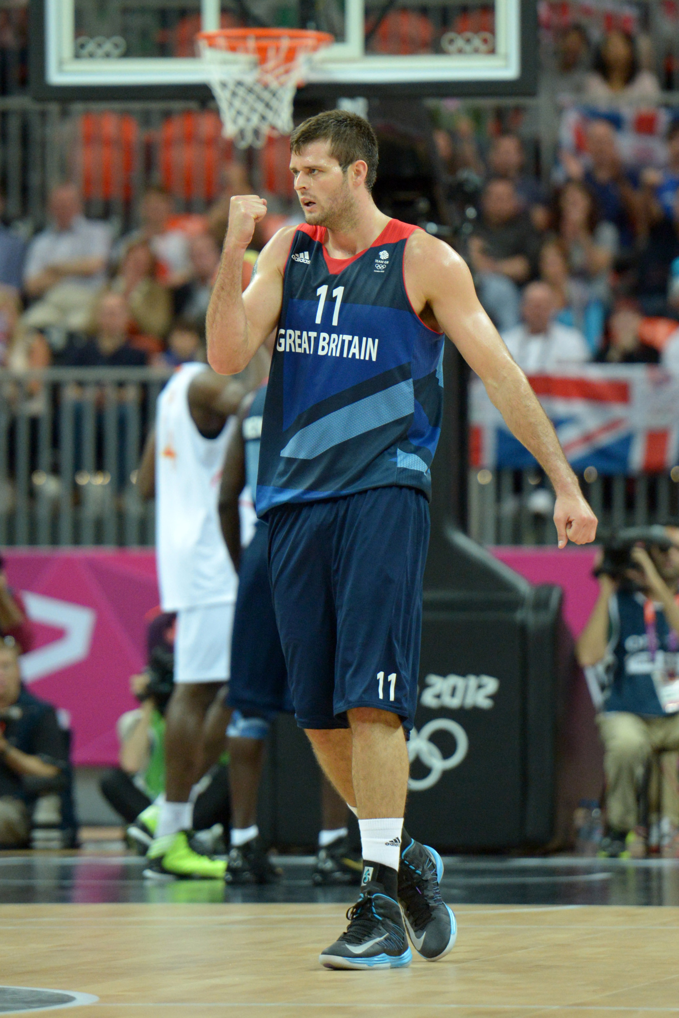 Aug 2, 2012; London, United Kingdom; Great Britain forward Joel Freeland (11) reacts during the preliminary game against Spain in the London 2012 Olympic Games at Basketball Arena. Mandatory Credit: Kirby Lee-USA TODAY Sports
