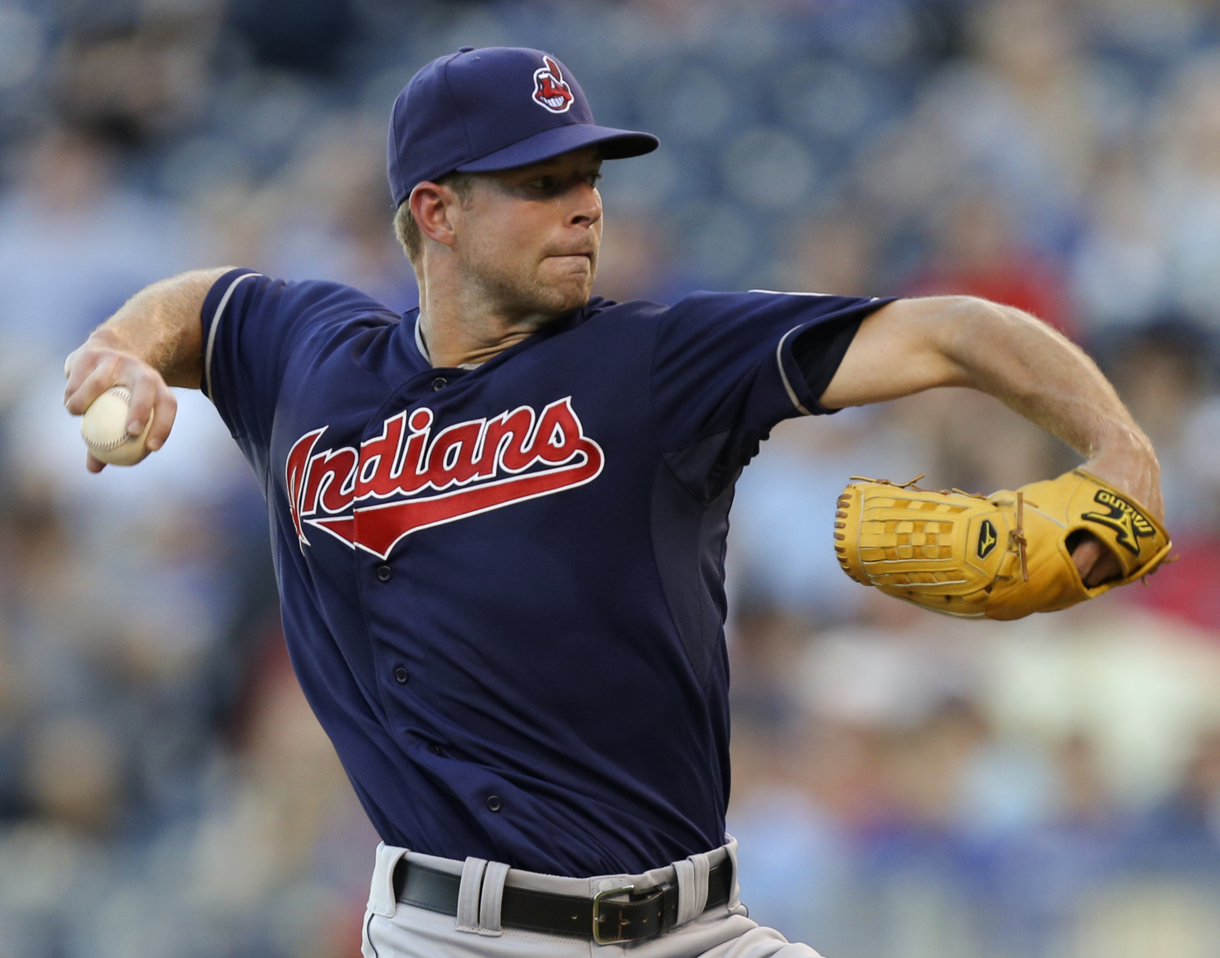KANSAS CITY, MO - AUGUST 02:  Corey Kluber #28 of the Cleveland Indians pitches against the Kansas City Royals in the first inning at Kauffman Stadium on August 2, 2012 in Kansas City, Missouri. (Photo by Ed Zurga/Getty Images)