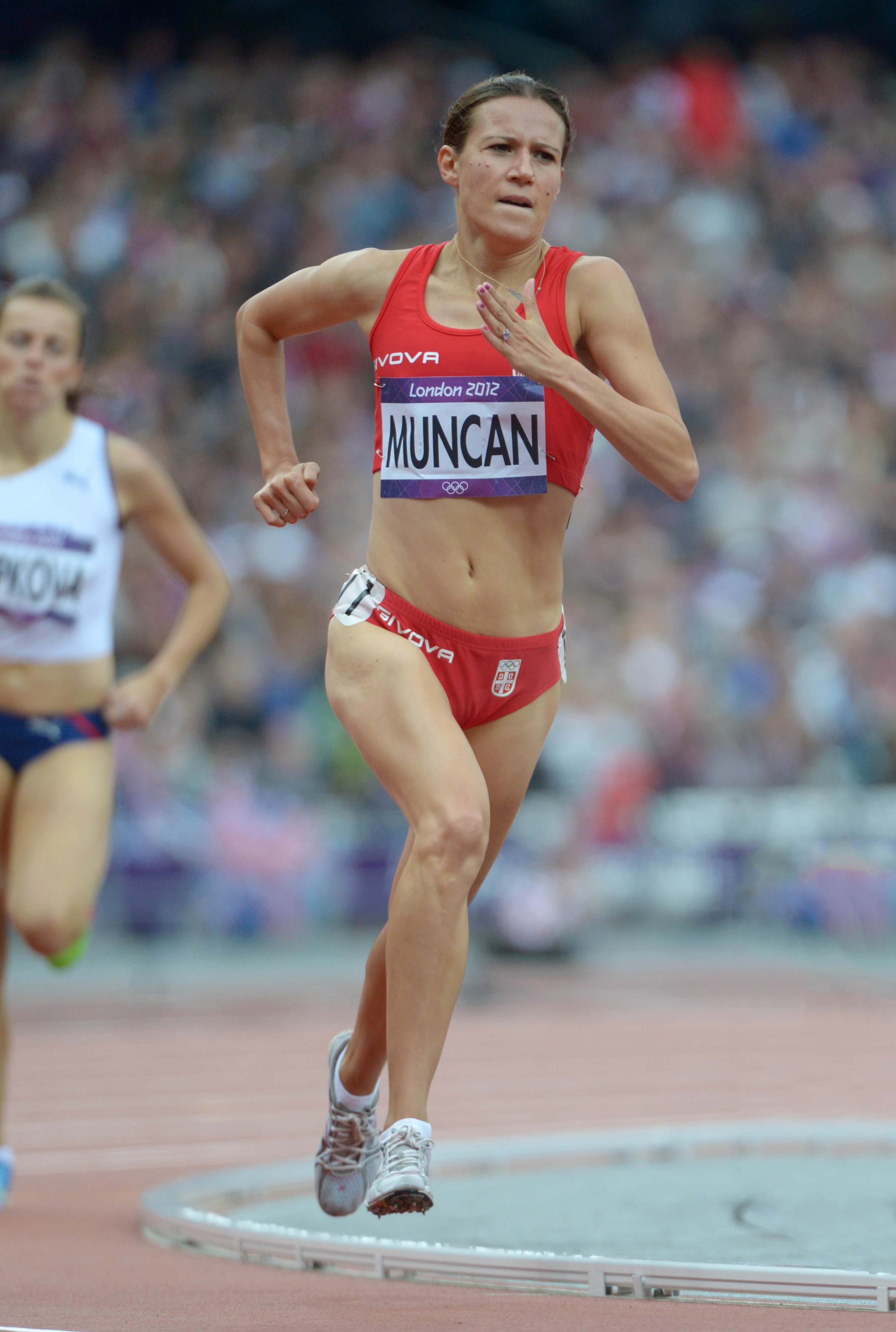 Aug 6, 2012; London, United Kingdom; Marina Muncan (SRB) runs 4:11.25 in a womens 1,500m heat during the London 2012 Olympic Games at Olympic Stadium. Mandatory Credit: Kirby Lee-USA TODAY Sports