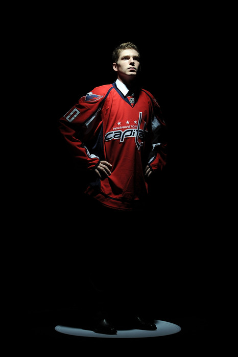 LOS ANGELES, CA - JUNE 25:  Evgeny Kuznetsov, drafted 26th overall by the Washington Capitals, poses on stage during the 2010 NHL Entry Draft at Staples Center on June 25, 2010 in Los Angeles, California.  (Photo by Harry How/Getty Images)