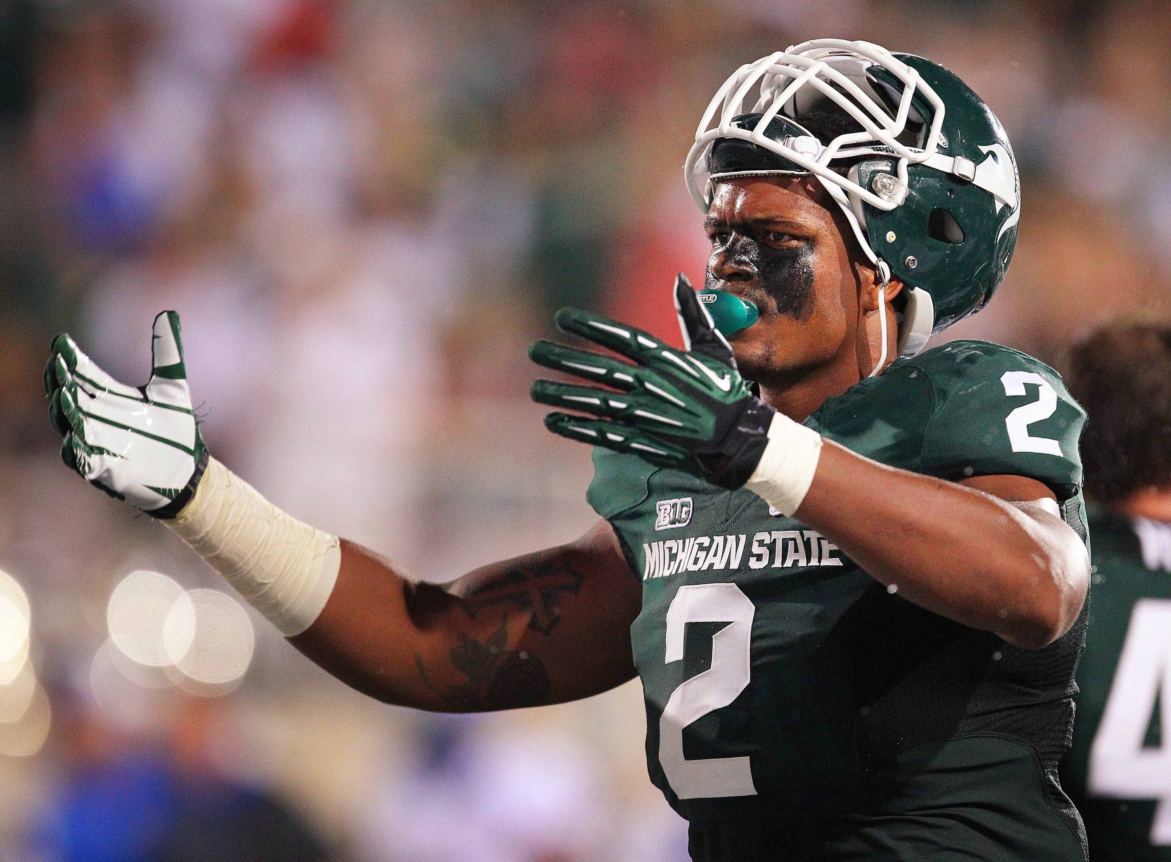 August 31, 2012; East Lansing, MI, USA; Michigan State Spartans defensive end William Gholston (2) reacts after call during the second half at Spartan Stadium. MSU won 17-13    Mandatory Credit: Mike Carter-US PRESSWIRE