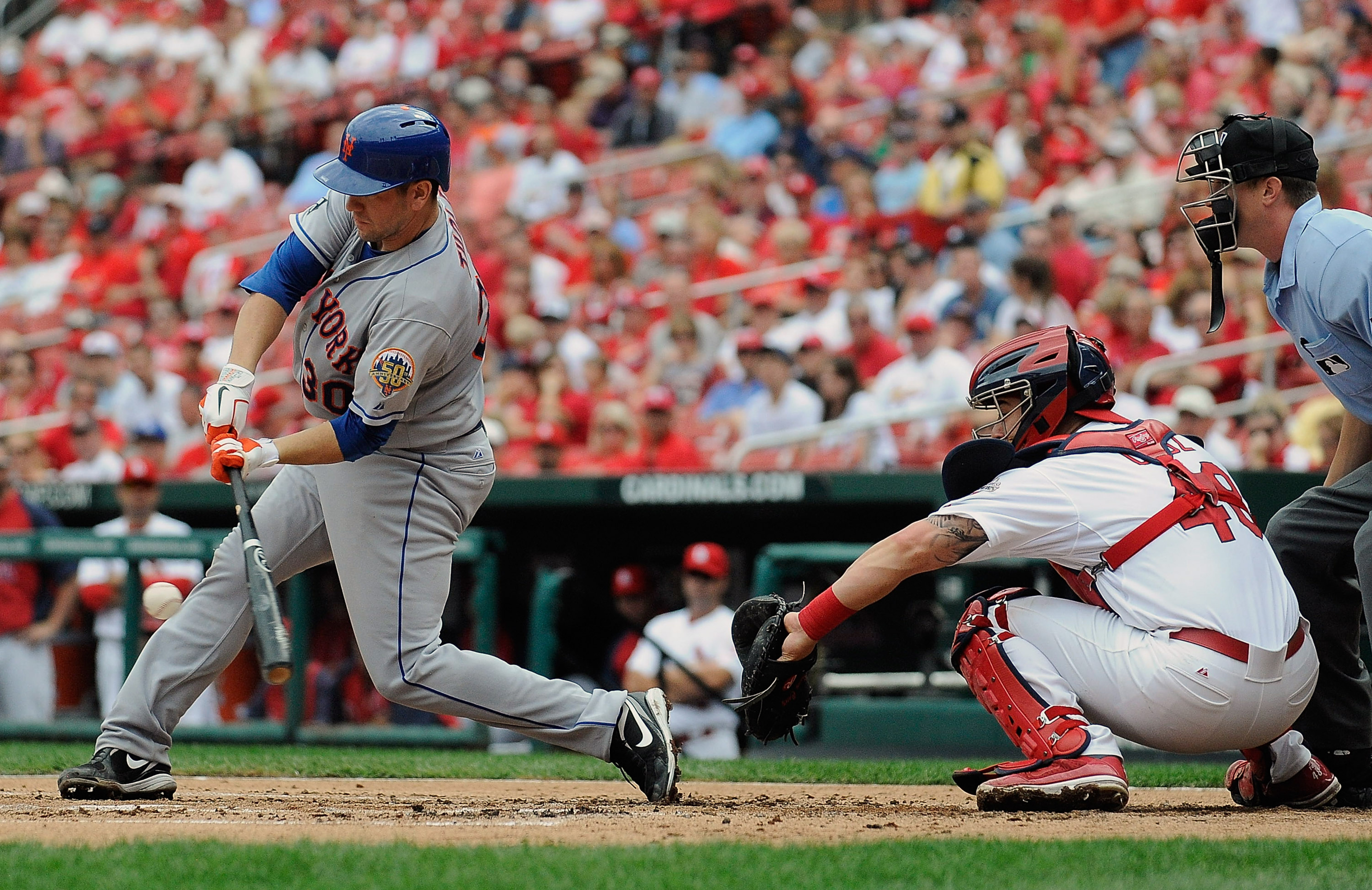 ST. LOUIS, MO - SEPTEMBER 5: Josh Thole #30 of the New York Mets hits a one run single against the St. Louis Cardinals at Busch Stadium on September 5, 2012 in St. Louis, Missouri. (Photo by Jeff Curry/Getty Images)