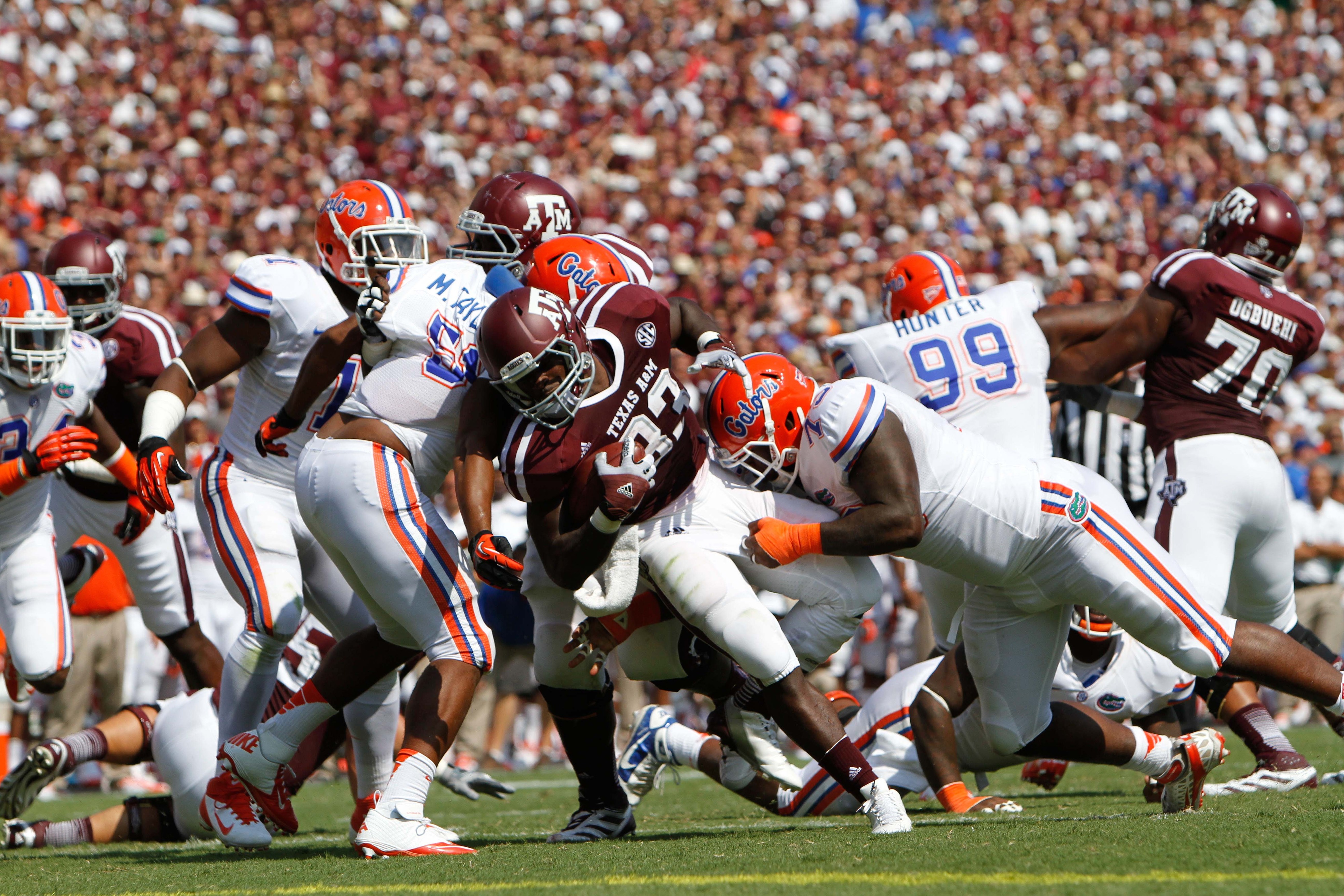 Sep 8, 2012; College Station, TX, USA; Texas A&M Aggies running back Christine Michael (33) runs the ball against the Florida Gators in the second quarter at Kyle Field. Mandatory Credit: Brett Davis-US PRESSWIRE