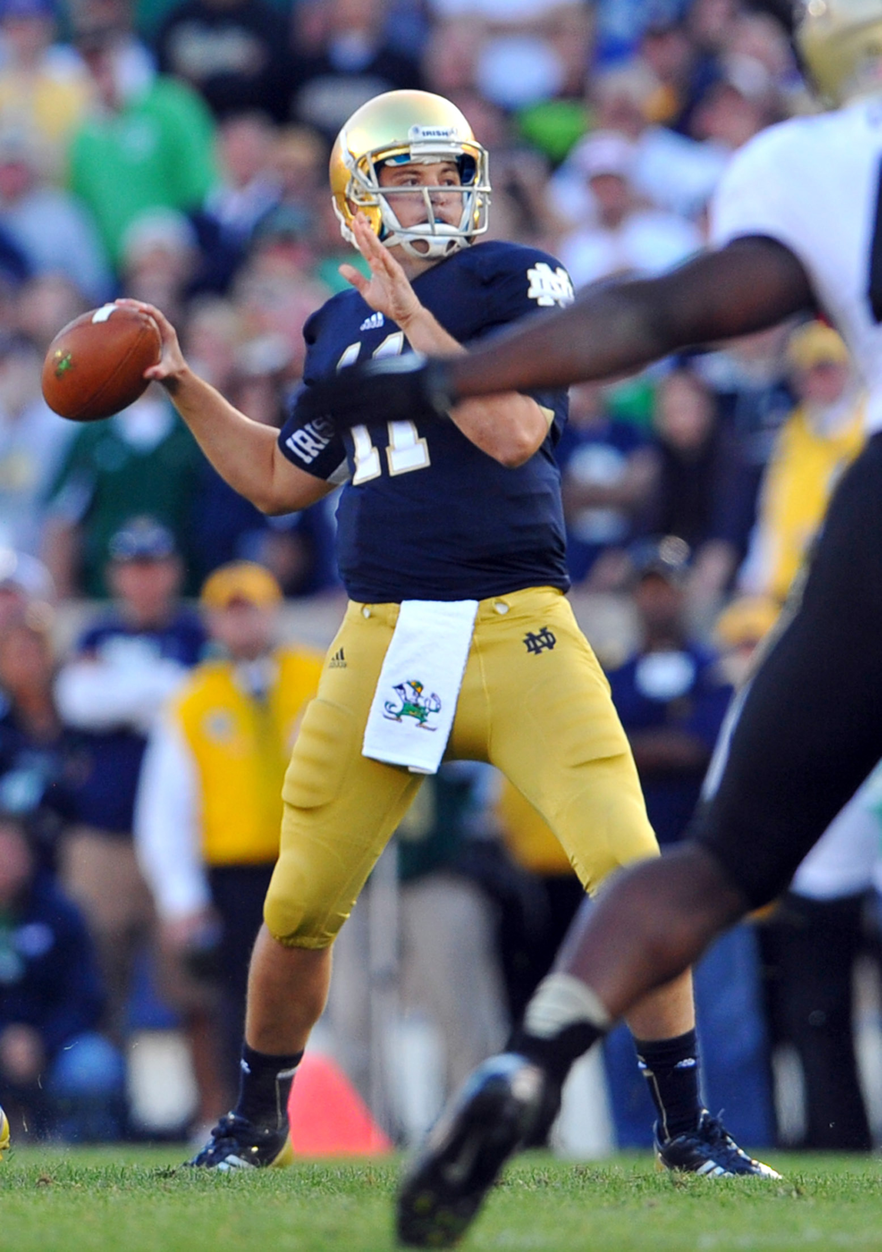 Sep 8, 2012; South Bend, IN, USA; Notre Dame Fighting Irish quarterback Tommy Rees (11) throws in the fourth quarter against the Purdue Boilermakers at Notre Dame Stadium. Notre Dame won 20-17. Mandatory Credit: Matt Cashore-US PRESSWIRE