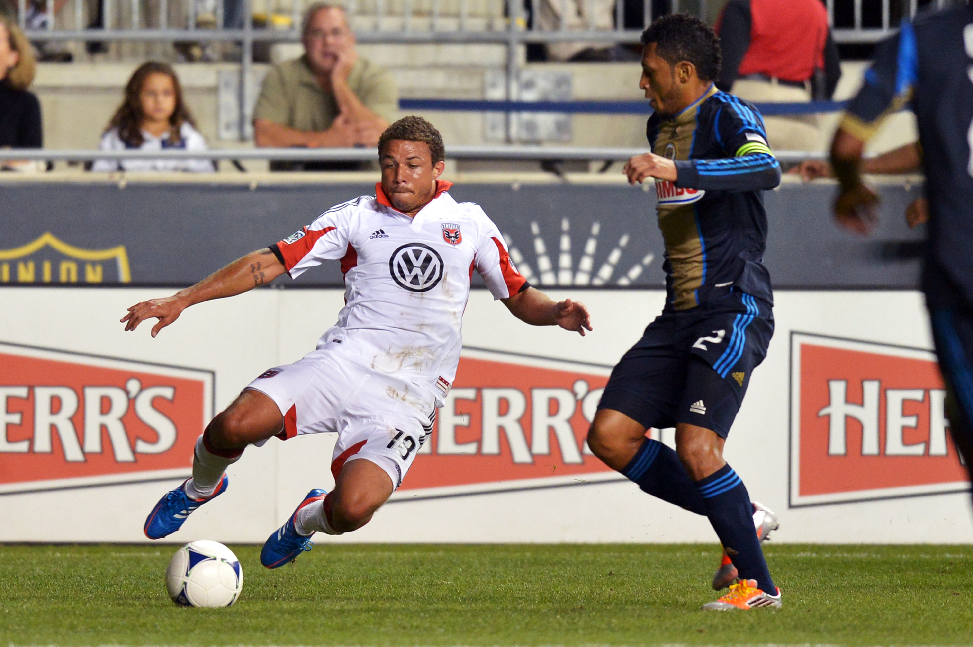 CHESTER, PA - SEPTEMBER 20: Nick DeLeon #18 of the D.C. United slides for the ball in from of Carlos Valdes #2 of the Philadelphia Union at PPL Park on September 20, 2012 in Chester, Pennsylvania. (Photo by Drew Hallowell/Getty Images)