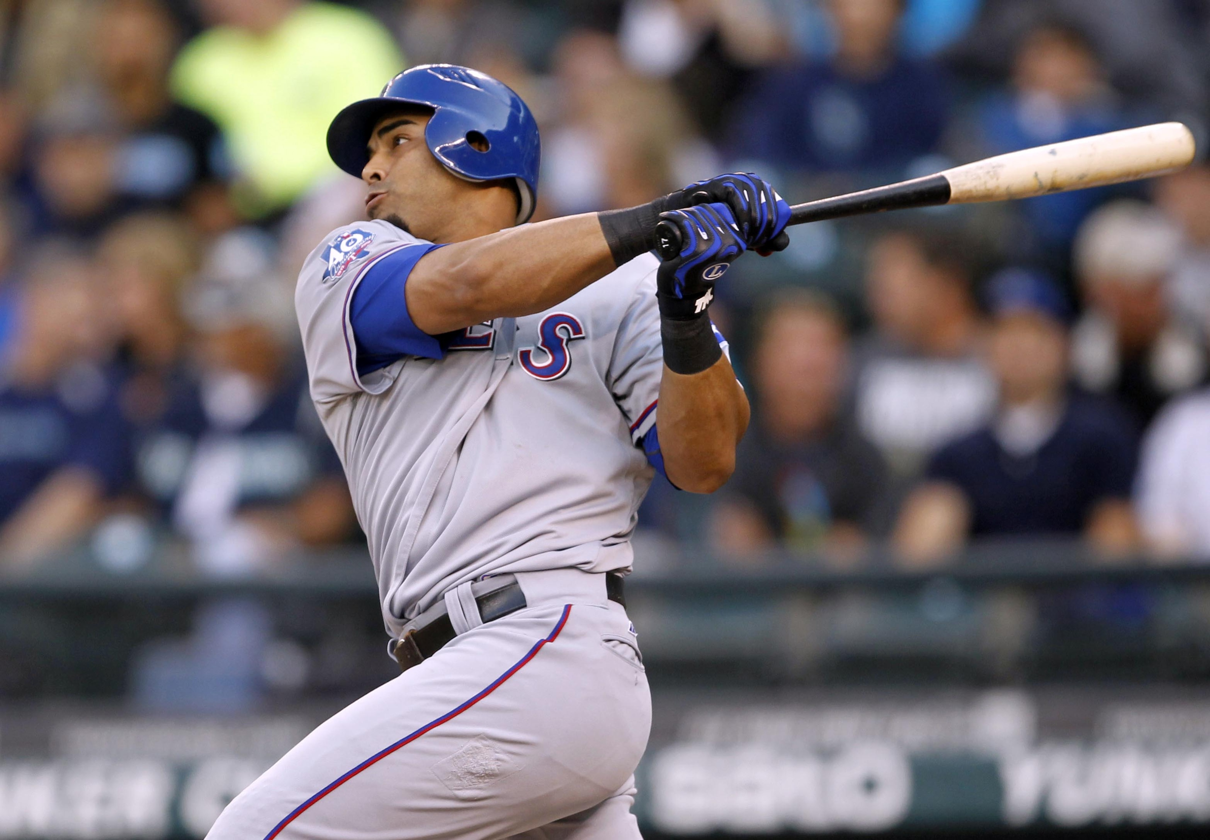 Sept 22, 2012; Seattle, WA, USA; Texas Rangers right fielder Nelson Cruz doubles against the Seattle Mariners during the second inning at Safeco Field. Mandatory Credit: Joe Nicholson-US PRESSWIRE