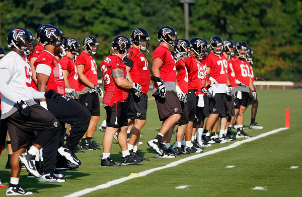 FLOWERY BRANCH GA - JULY 30:  The Atlanta Falcons stretch during opening day of training camp on July 30 2010 at the Falcons Training Complex in Flowery Branch Georgia.  (Photo by Kevin C. Cox/Getty Images)
