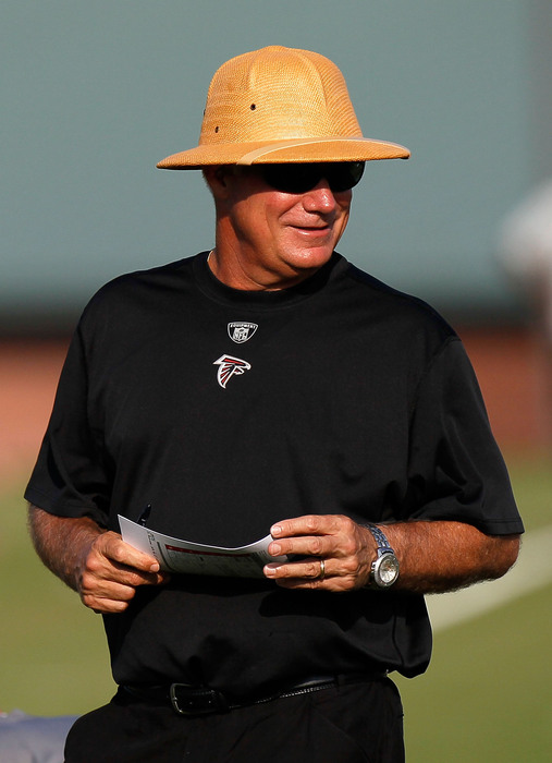 FLOWERY BRANCH GA - JULY 30:  Head coach Mike Smith of the Atlanta Falcons looks on during opening day of training camp on July 30 2010 at the Falcons Training Complex in Flowery Branch Georgia.  (Photo by Kevin C. Cox/Getty Images)