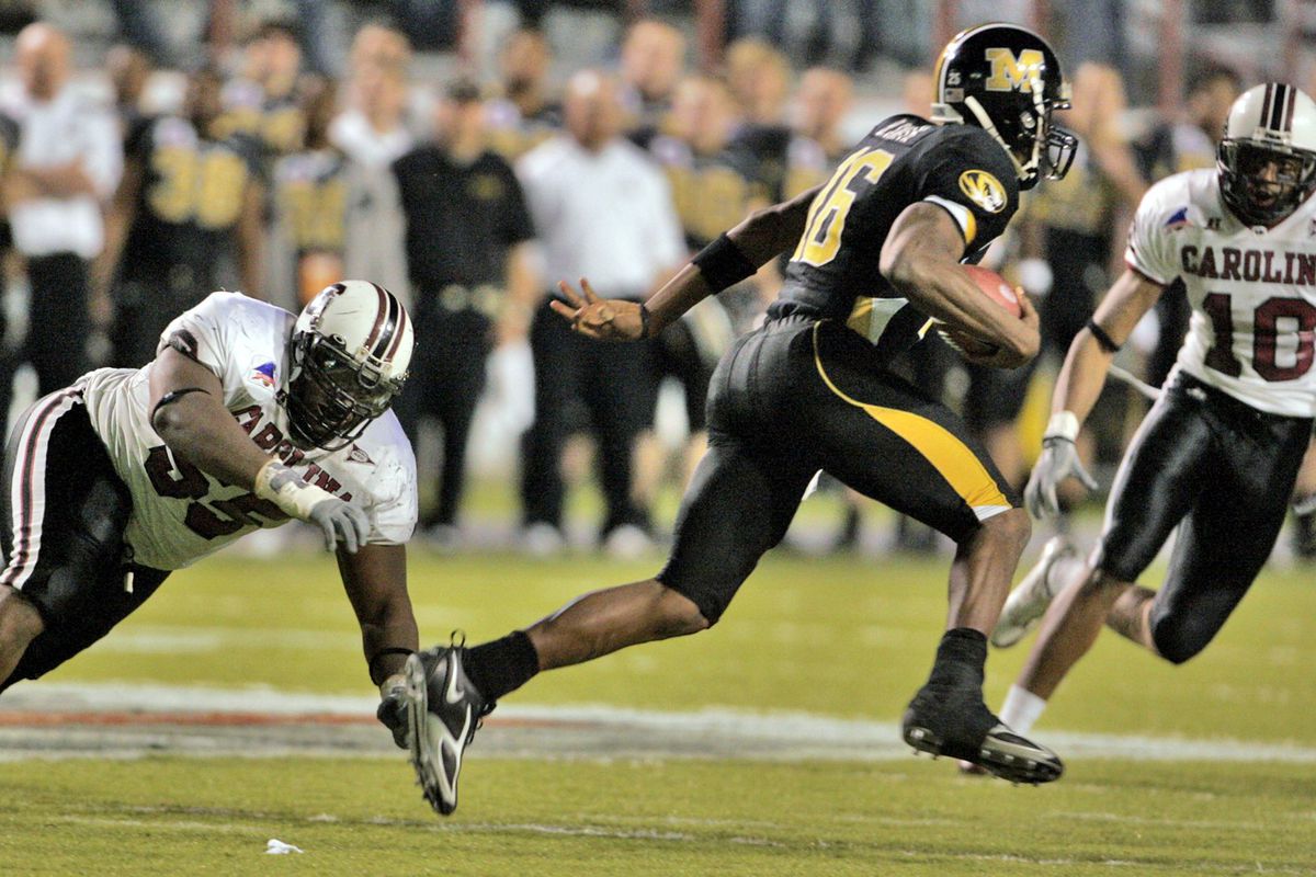 South Carolina’s Stanley Doughty, left, misses a tackle on M