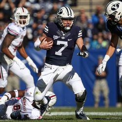 Brigham Young Cougars quarterback Taysom Hill (7) runs the ball during a game against the UMass Minutemen at LaVell Edwards Stadium in Provo on Saturday, Nov. 19, 2016.