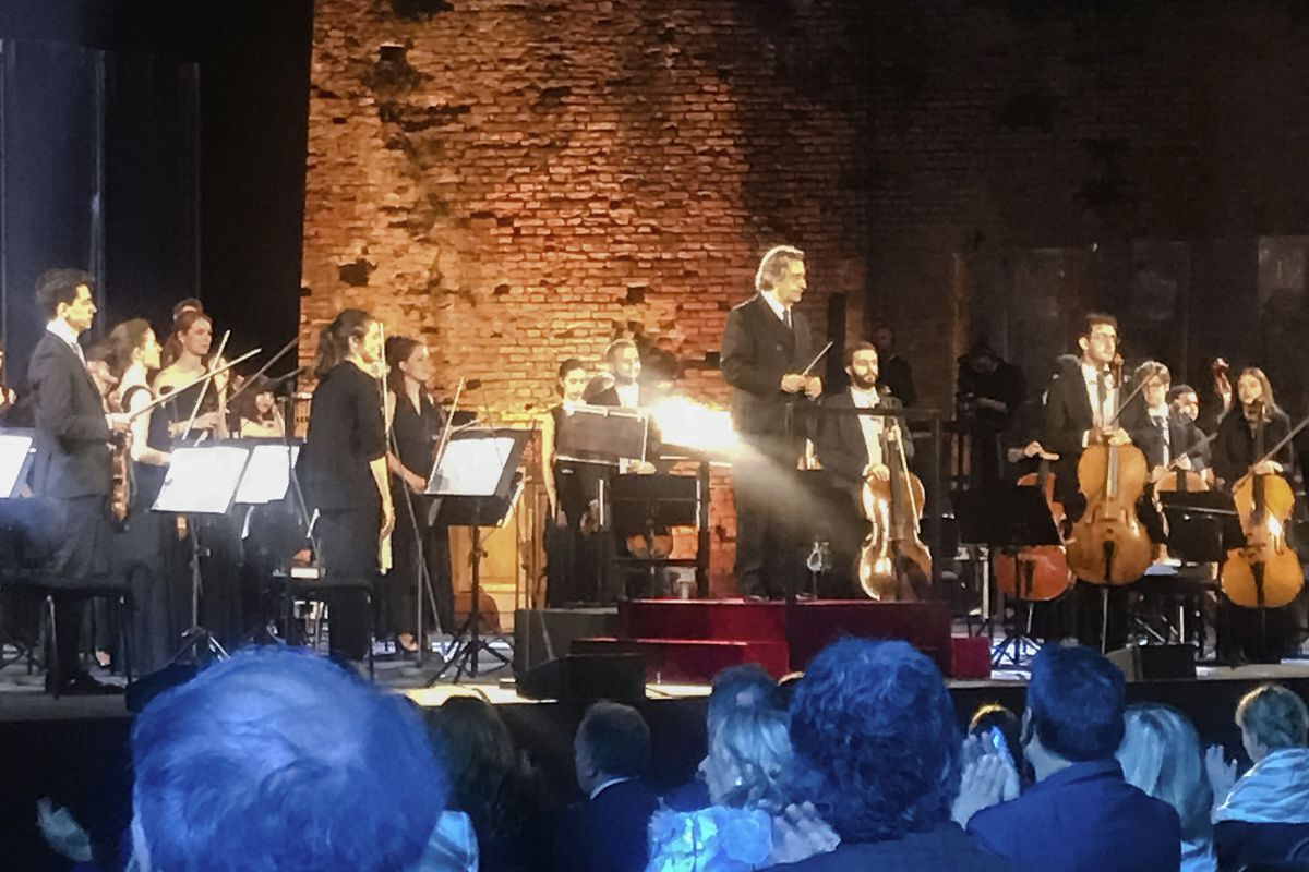 In this 2020 file photo, Italian Maestro Riccardo Muti, top center, prepares to direct a concert at the Ravenna Festival, in Ravenna, Italy. 