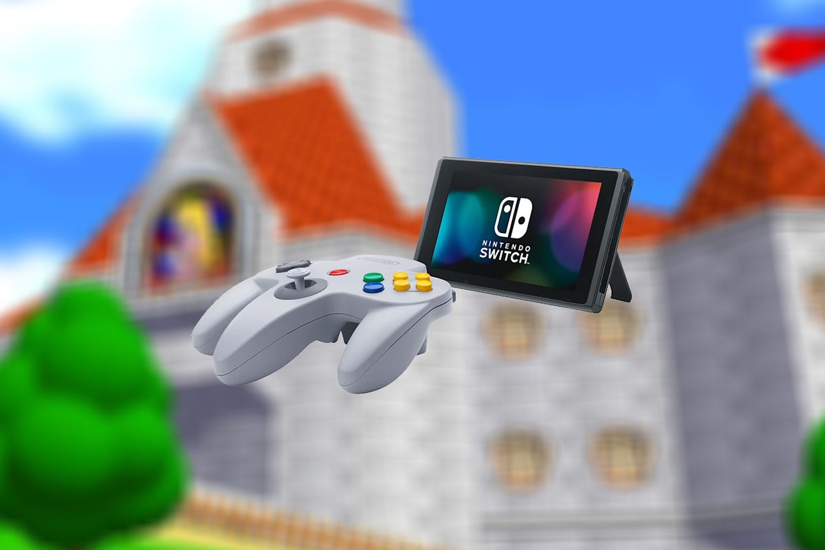 A stock photo of the wireless N64 controller next to a Nintendo Switch.