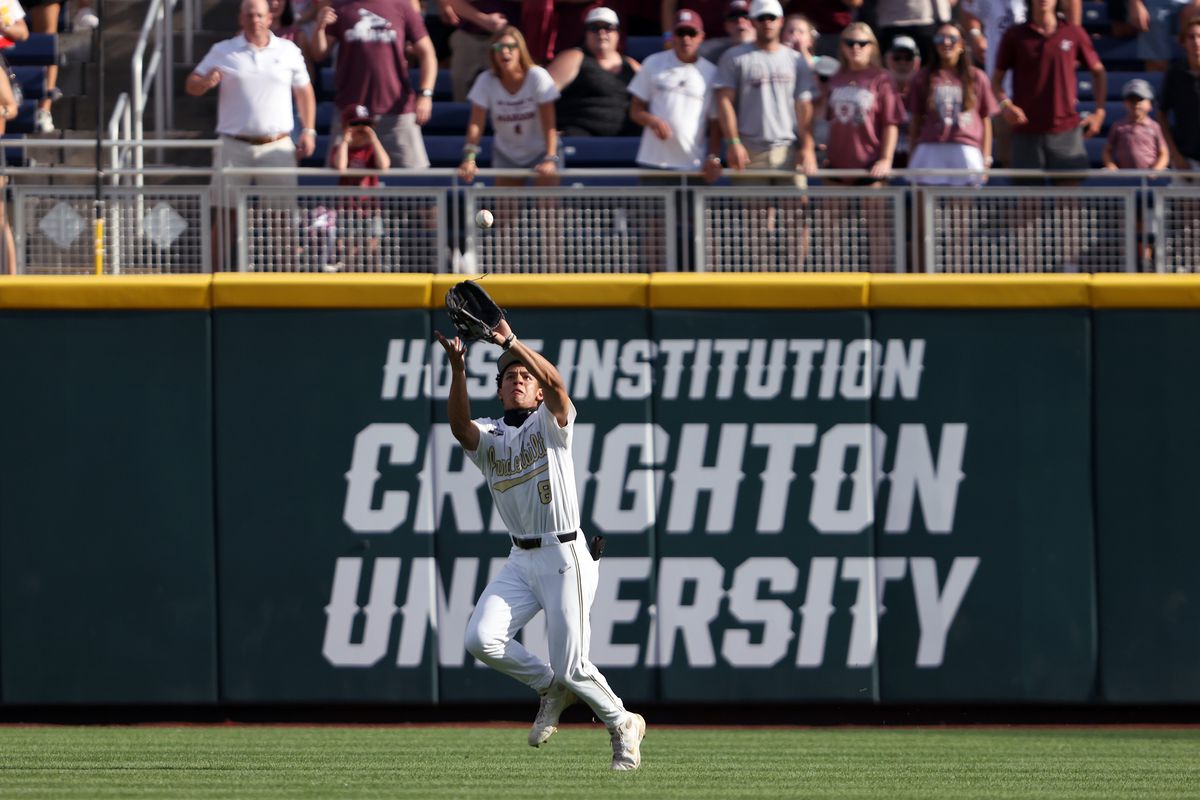 Isaiah Thomas of the Vanderbilt fields a sacrifice fly ball hit by Luke Hancock of the Mississippi St. in the top of the first inning during game three of the College World Series Championship at TD Ameritrade Park Omaha on June 30, 2021 in Omaha, Nebraska.