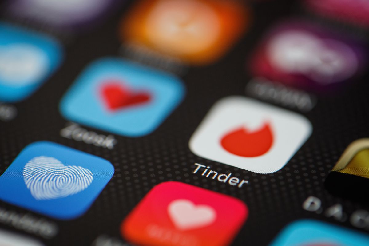 Dating app icons on a smartphone screen