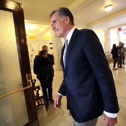 Mitt Romney walks through the Capitol after addressing House and Senate Republicans during their caucus lunch meetings in Salt Lake City on Tuesday, Feb. 27, 2018.