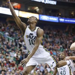 Utah Jazz's point guard Alec Burks (10) flies to the basket as the Utah Jazz and the San Antonio Spurs play Saturday, Dec. 14, 2013 at EnergySolutions Arena in Salt Lake City. The Spurs won 100-84.