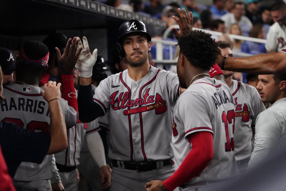 Atlanta Braves first baseman Matt Olson (28) celebrates in the dugout with teammates after hitting a solo home run in the fourth inning against the Miami Marlins at loanDepot park.