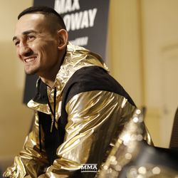 Max Holloway answers questions at UFC 218 media day.