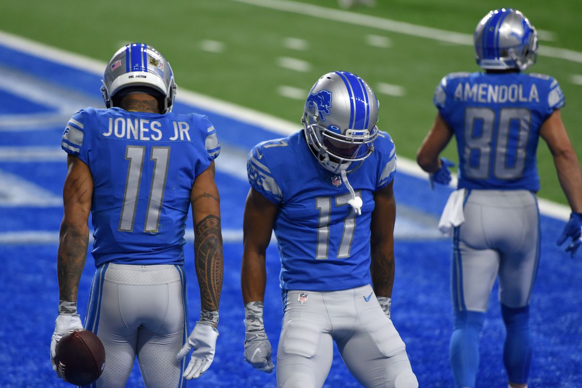 Marvin Jones #11 and Marvin Hall #17 of the Detroit Lions react following a touchdown during their game against the Washington Football Team at Ford Field on November 15, 2020 in Detroit, Michigan.