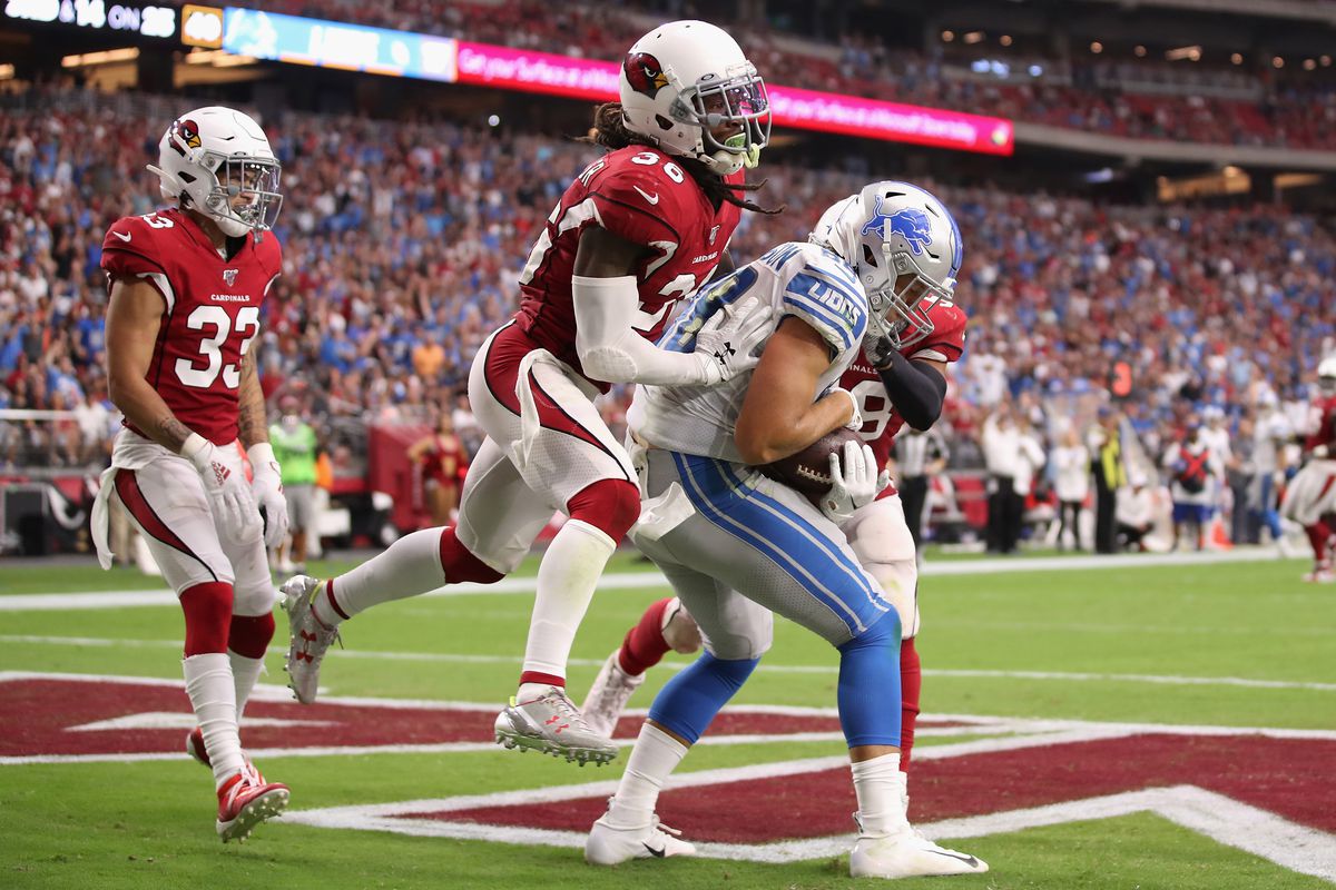 Tight end T.J. Hockenson of the Detroit Lions catches a 23 yard touchdown against free safety D.J. Swearinger of the Arizona Cardinals during the second half of the NFL game at State Farm Stadium on September 08, 2019 in Glendale, Arizona.