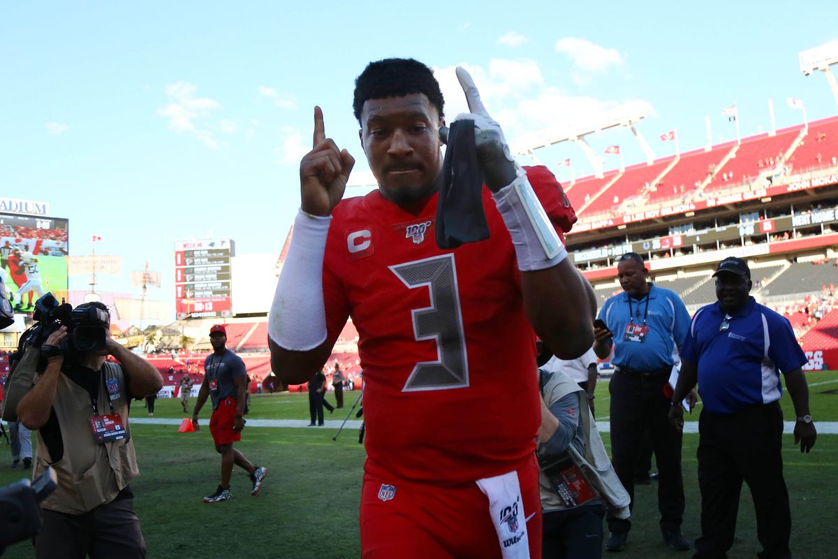 Tampa Bay Buccaneers quarterback Jameis Winston celebrates as he runs off the field after they beat the Indianapolis Colts at Raymond James Stadium.