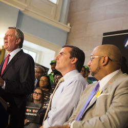 New York Mayor Bill de Blasio speaks at a rally where he announces a plan to fund MTA improvements on Monday, Aug. 7, 2017, in New York. De Blasio wants to tax the wealthiest 1 percent of city residents to fund repairs and improvements to the nation's largest subway system. (AP Photo/Michael Noble Jr.)