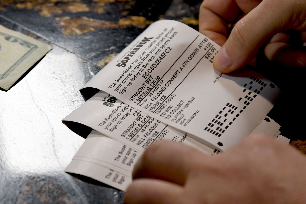 A bettor places a wager on the Super Bowl at a Las Vegas casino.