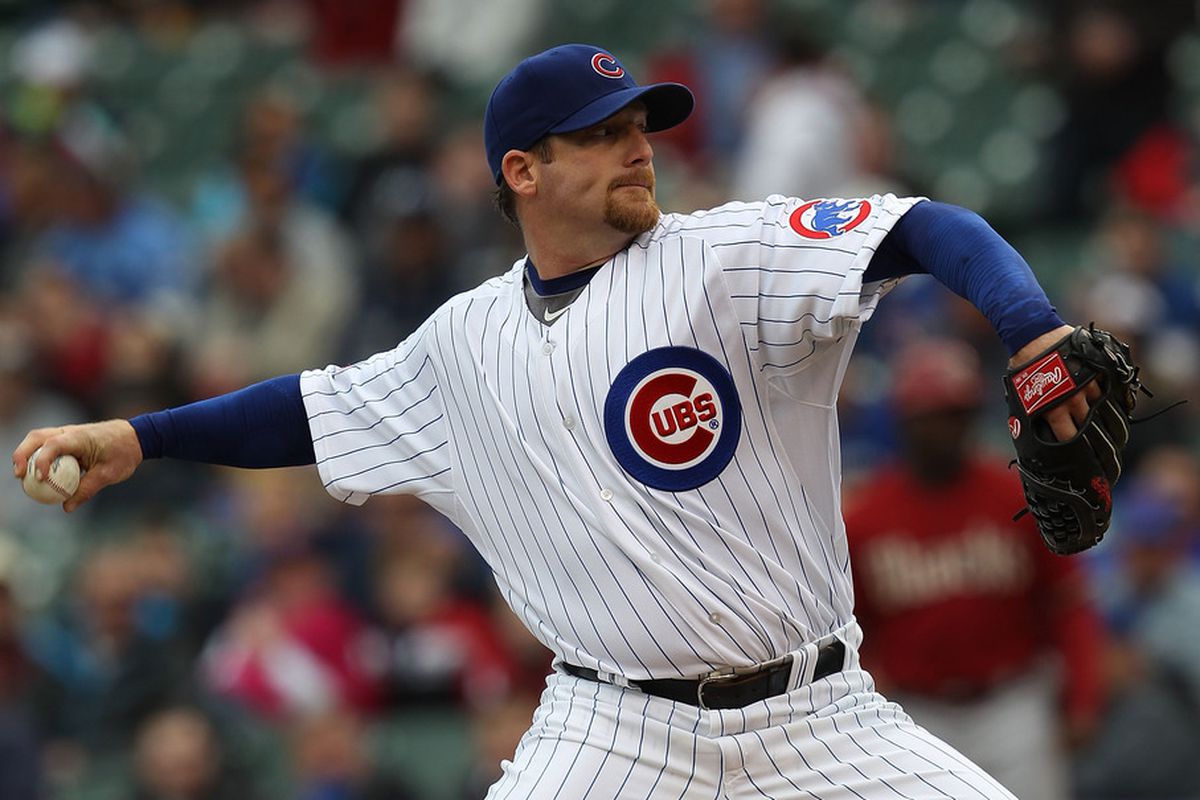 Starting pitcher Ryan Dempster of the Chicago Cubs delivers the ball against the Arizona Diamondbacks at Wrigley Field in Chicago, Illinois. (Photo by Jonathan Daniel/Getty Images)