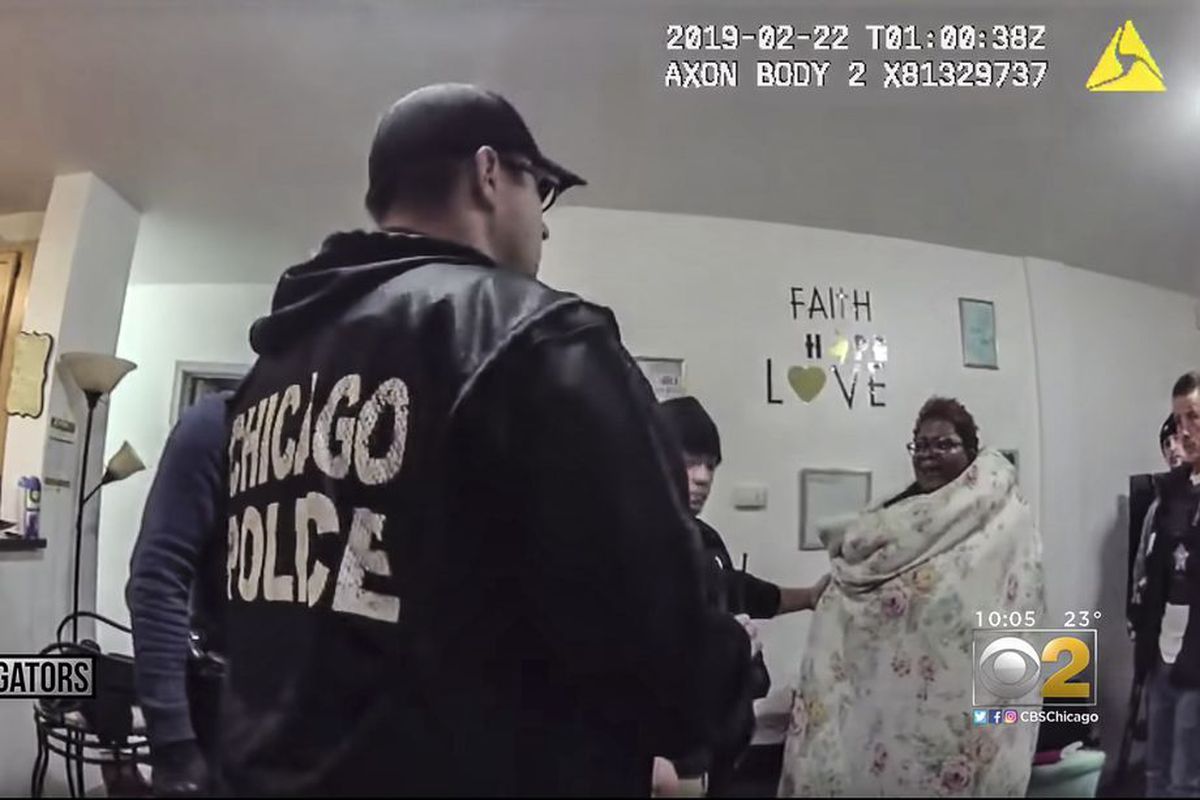 A screenshot from body-camera video of a police raid in 2019 at the home of social worker Anjanette Young. The police were in the wrong home.