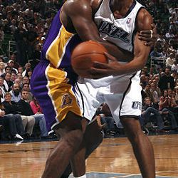 Utah's Ronnie Price is fouled by the Lakers' Ron Artest at EnergySolutions Arena on Wednesday. Los Angeles won 96-81.
