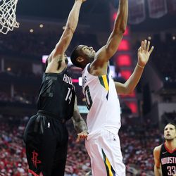 Utah Jazz guard Alec Burks (10) flips up a shot over Houston Rockets forward Trevor Ariza (1) as the the Utah Jazz and the Houston Rockets play game two of the NBA playoffs at the Toyota Center in Houston on Wednesday, May 2, 2018. 