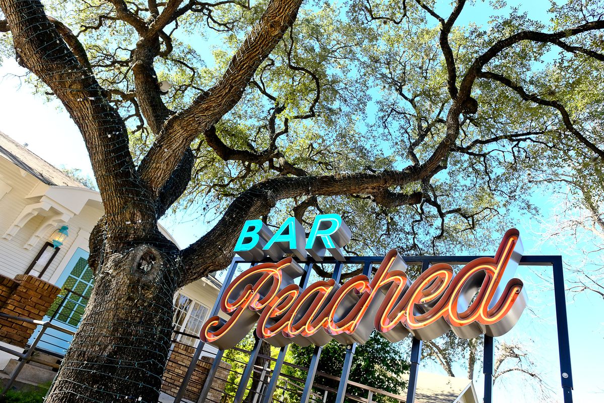 Bar Peached’s neon sign