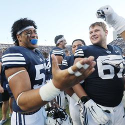 Brigham Young Cougars defensive lineman Alden Tofa (57) celebrates a good play in Provo on Saturday, Sept. 22, 2018. BYU won 30-3.