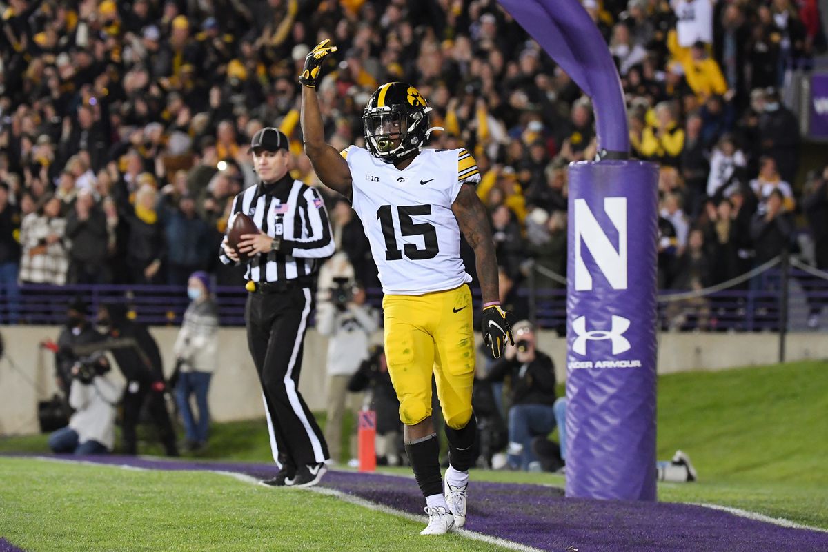 Iowa Hawkeyes running back Tyler Goodson (15) celebrates after his touchdown in the first half against the Northwestern Wildcats at Ryan Field.