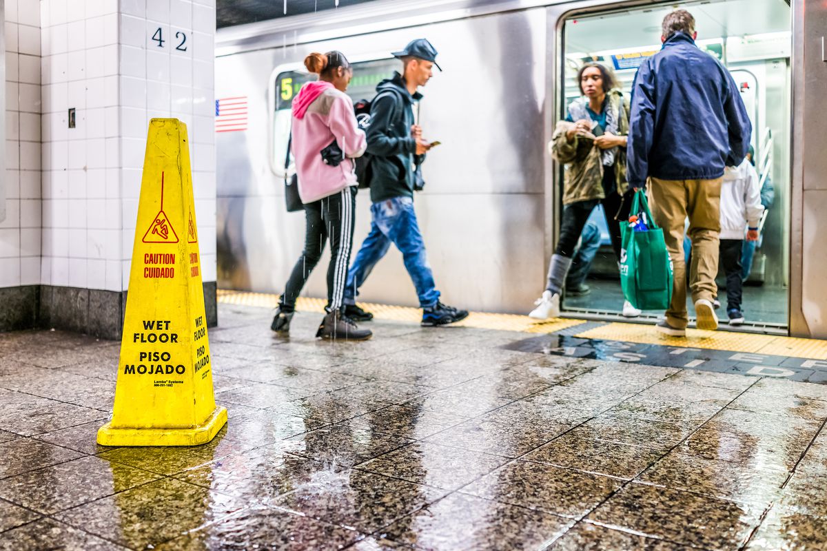 Water floods into the Grand Central subway platform in 2017.