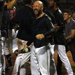 Bowling Green Manager Craig Albernaz soaked in celebratory champagne after winning the Midwest League Championship; 9-16-2018