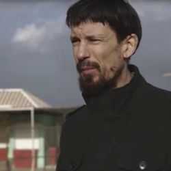 This still taken from video released Wednesday, Dec 7, 2016 by the Islamic State's Amaq news agency, shows captive British photojournalist John Cantlie in what appeared to be central Mosul, Iraq. Cantlie is seen in the propaganda video detailing the U.S.-led coalition's destruction of four of Mosul's five main bridges that he describes as inflicting harm of the city's sizeable civilian population. IS has long used Cantlie for propaganda purposes, featuring him in videos from Mosul as well as the Syrian cities of Aleppo and Kobani, likely speaking under duress. As Mosul's bridges were destroyed last month, this is the first confirmation that Cantlie is alive since he appeared in an IS video in July. (Islamic State's Amaq News Agency via AP)